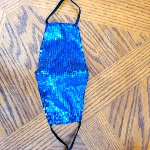 Sparkling blue face mask. New